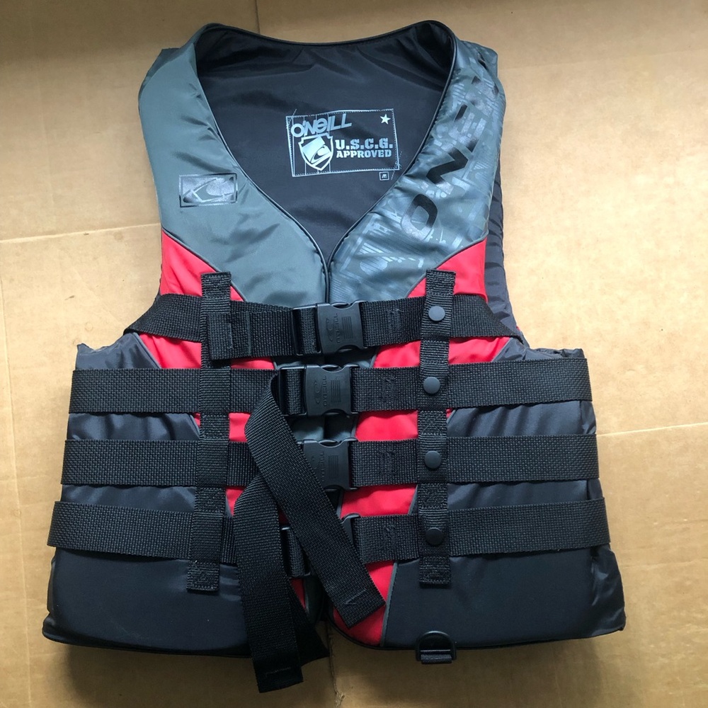 O'Neill Red, Black & Green USCG-Approved Life Vest (adult M).